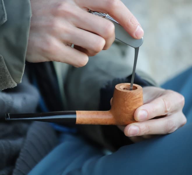 How to pack a pipe with tobacco?